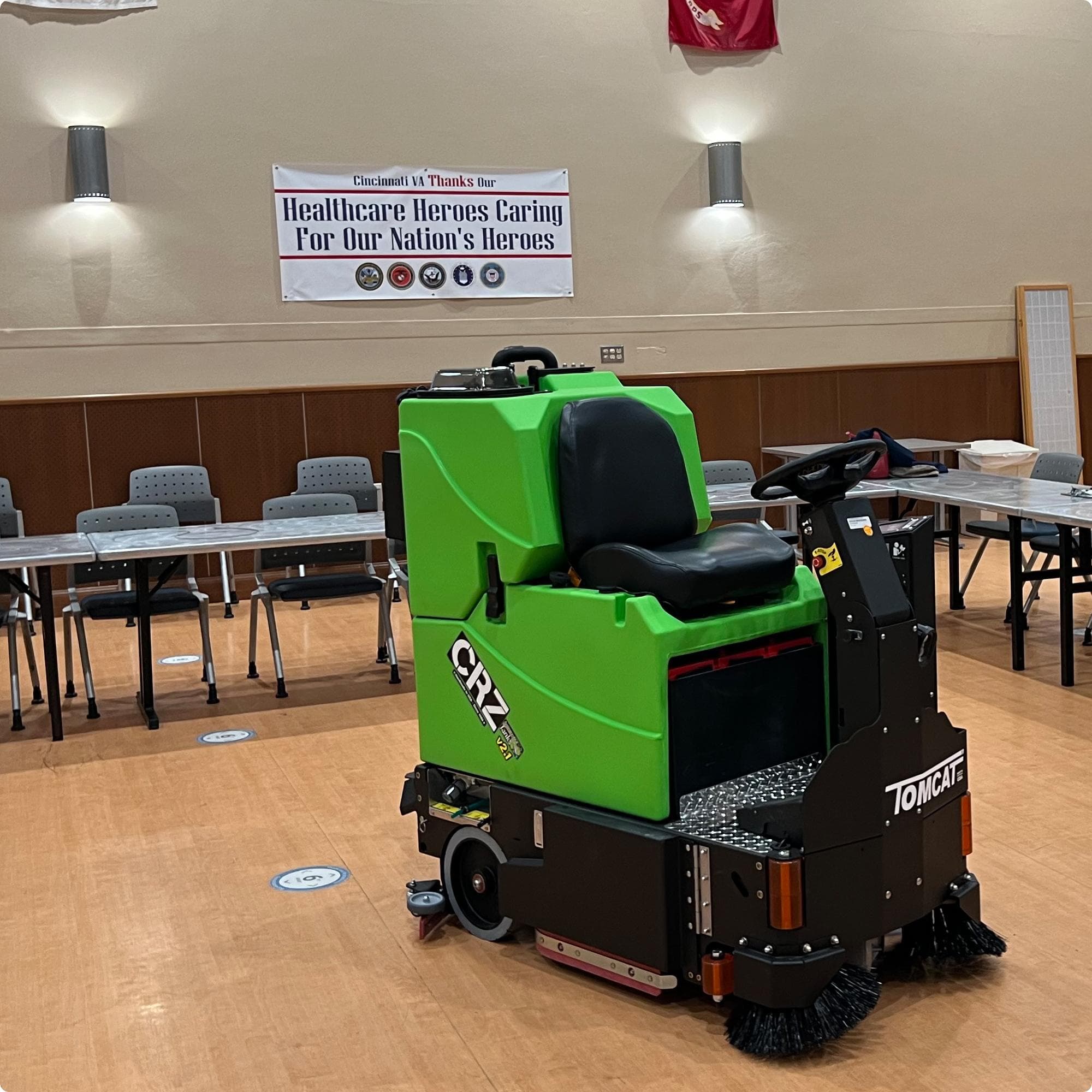 Tomcat CRZ v2.1 25" Cylindrical Deck Rider On Floor Scrubber with Anit-microbial Tank Option cleaning vinyl sheet goods in the multipurpoise room of a school IMG 00059