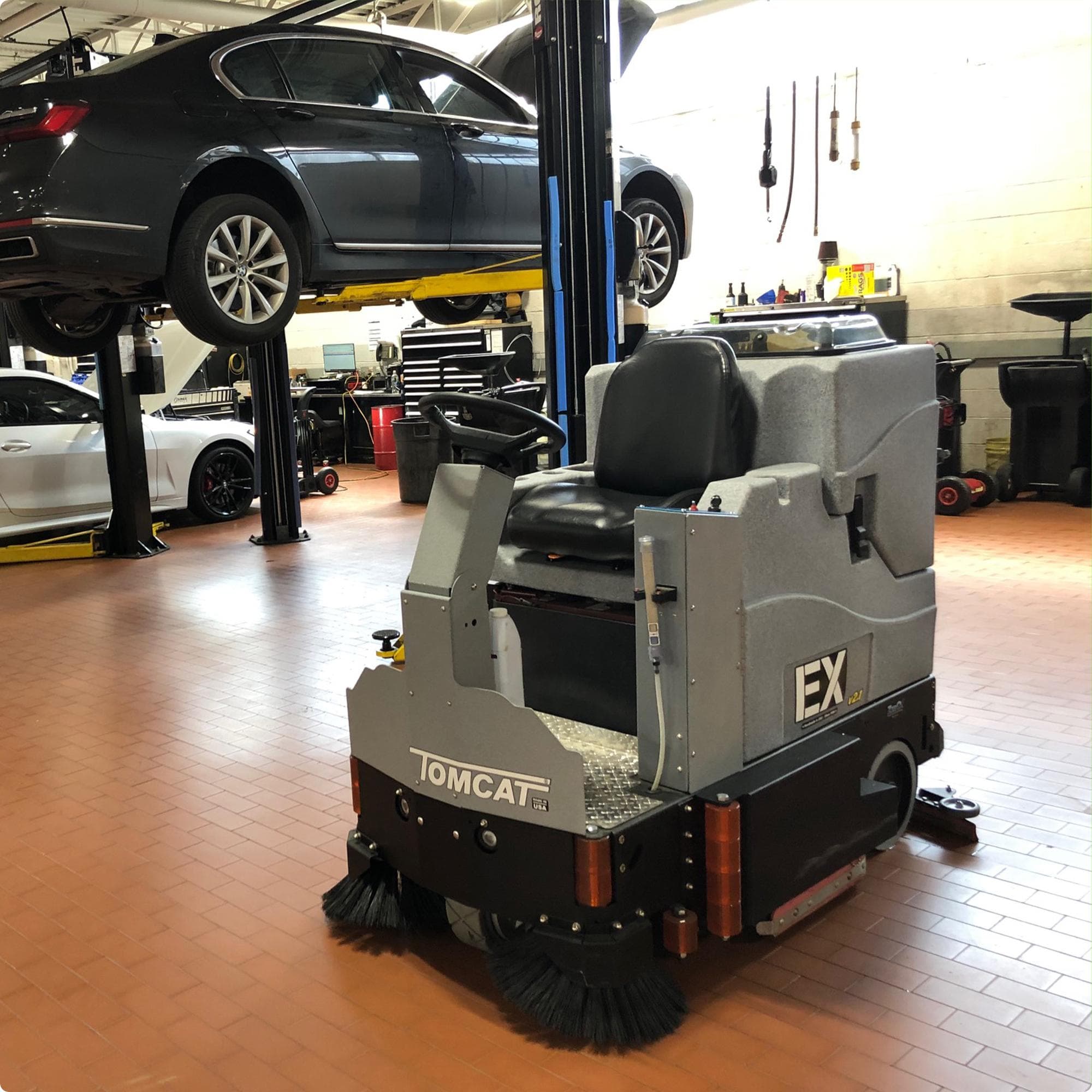 Tomcat EX 34" Cylindrical Deck Ride On Floor Scrubber cleaning brick in a service area in New Jersey IMG00018