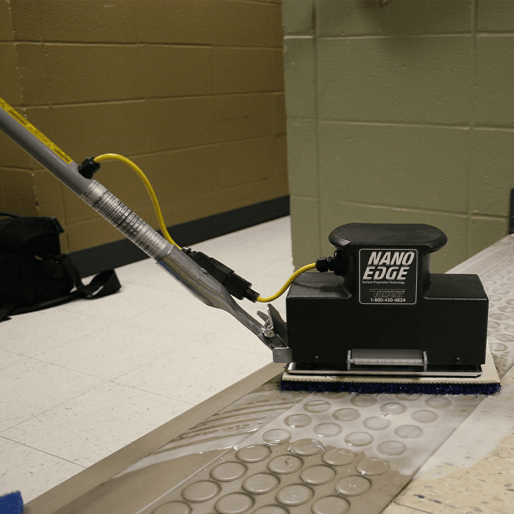 Tomcat floor scrubber showcasing its cleaning power