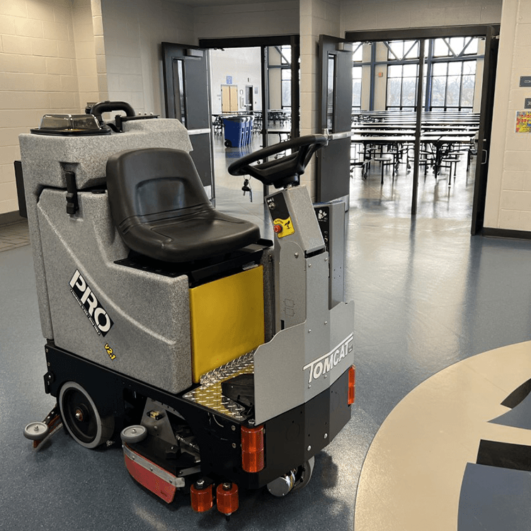 Tomcat floor scrubber showcasing its cleaning power