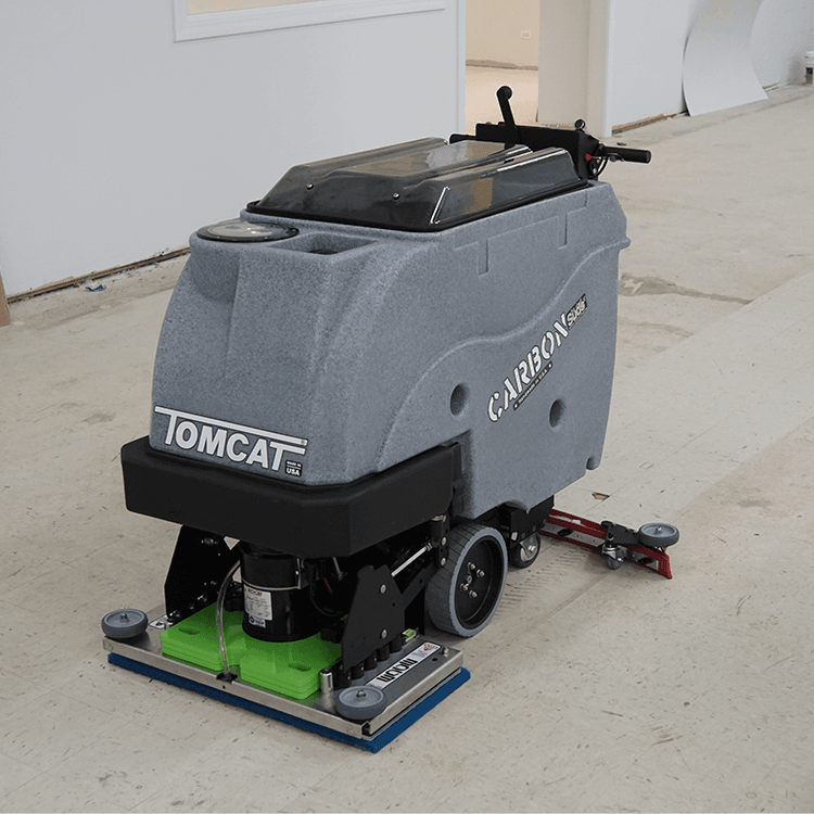 Tomcat floor scrubber showcasing its cleaning power