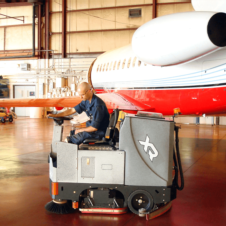 Tomcat floor scrubber showcasing its cleaning power