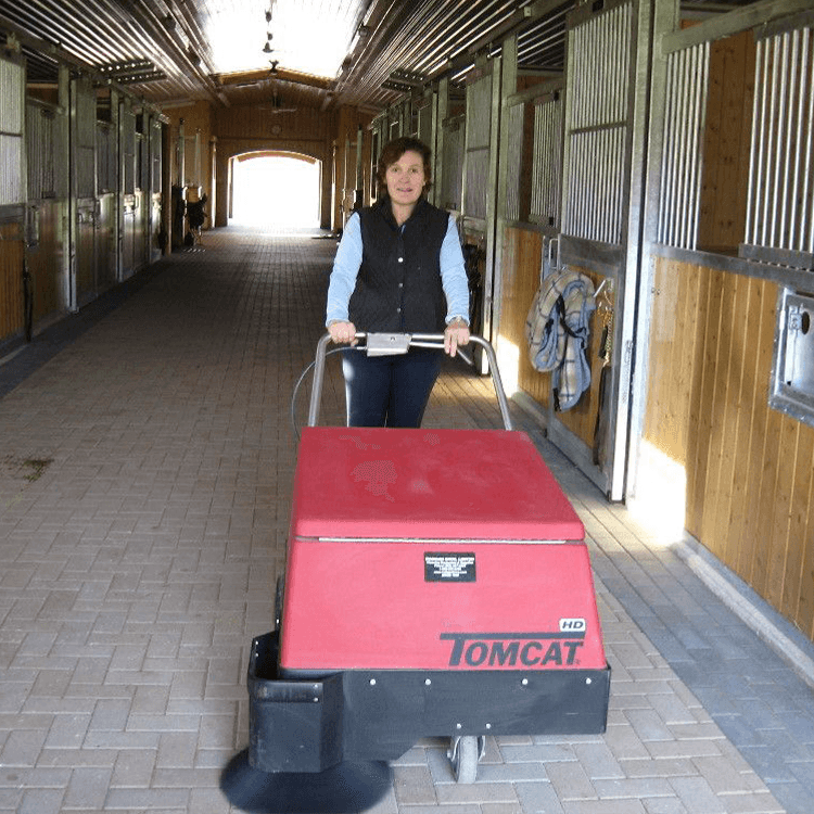 Tomcat floor scrubber showcasing its cleaning power