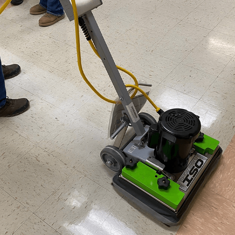 Tomcat floor scrubber showcasing its cleaning power