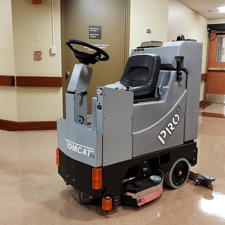 Tomcat floor scrubber showcasing its cleaning power