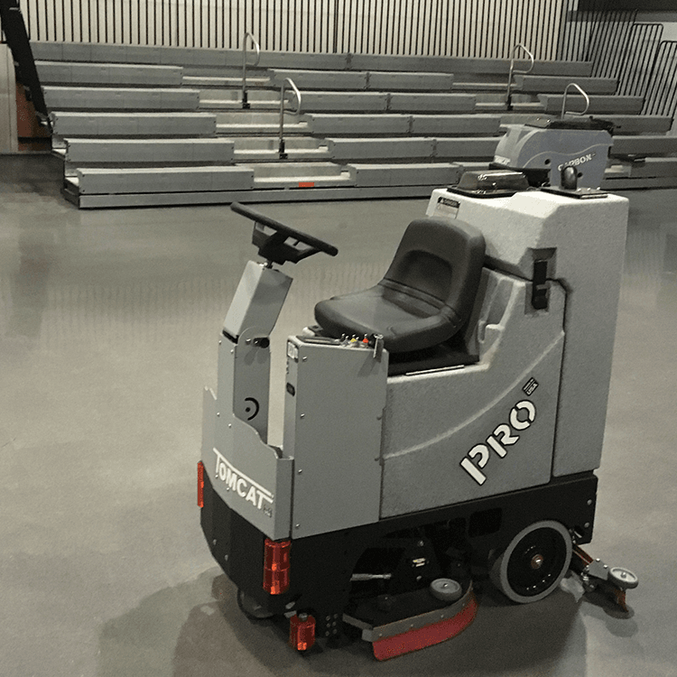 Tomcat floor scrubber showcasing its cleaning power