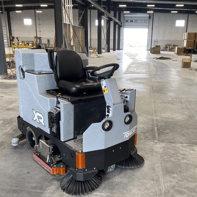 Tomcat floor scrubber showcasing its cleaning power