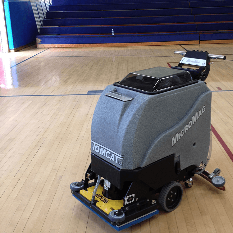 Tomcat floor scrubber showcasing its cleaning power