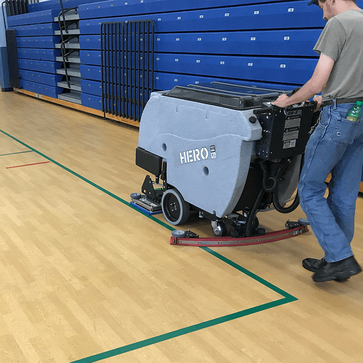 Tomcat floor scrubber showcasing its cleaning power