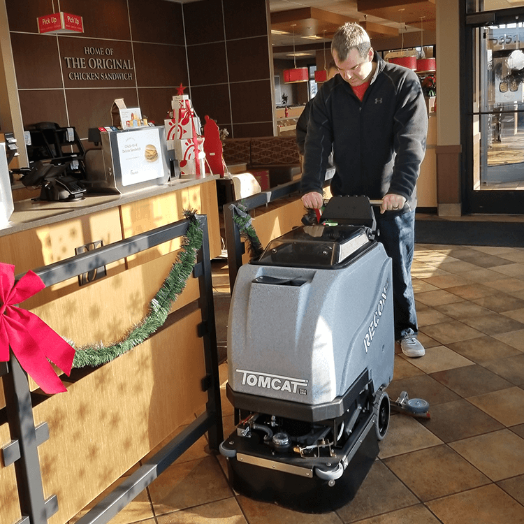 Tomcat floor scrubber showcasing its cleaning power