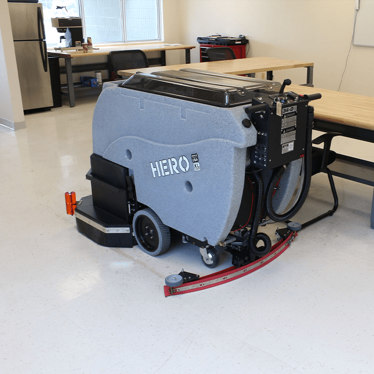 Tomcat floor scrubber showcasing its cleaning power