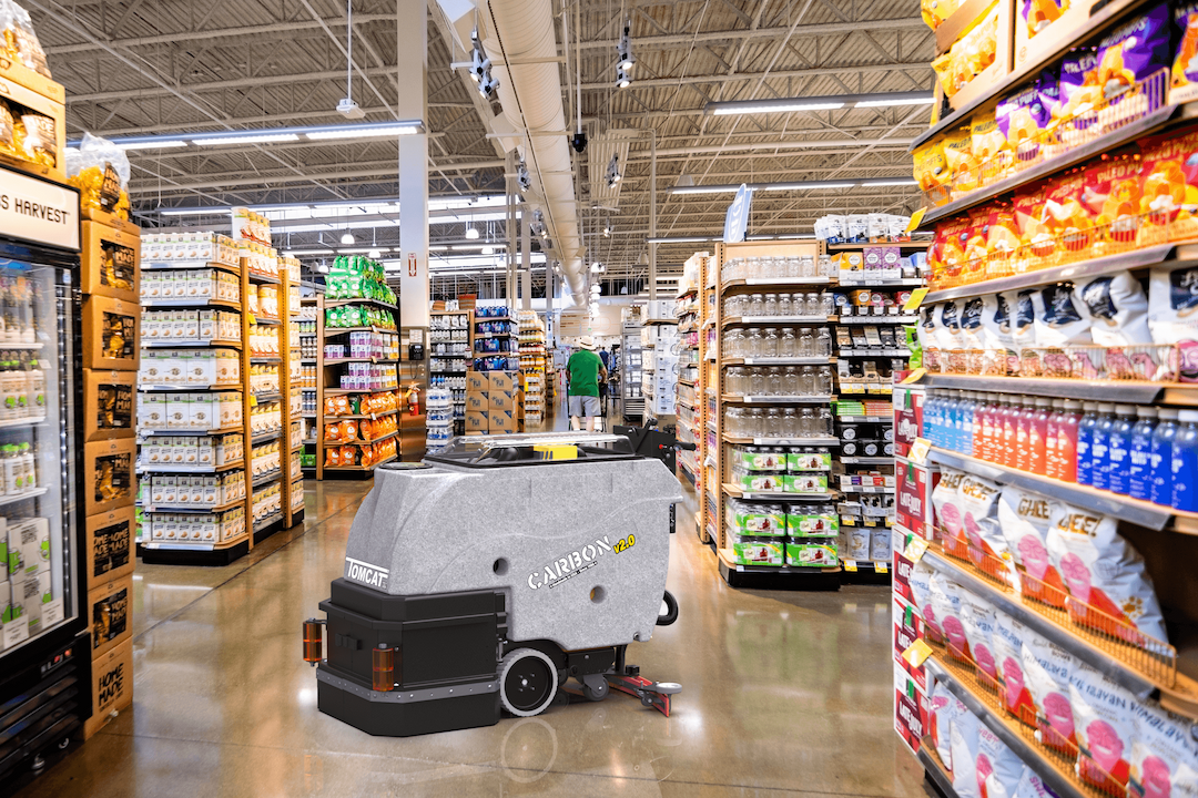 Tomcat showcasing the various applications of their floor scrubbers, in this case, in Retail - Grocery