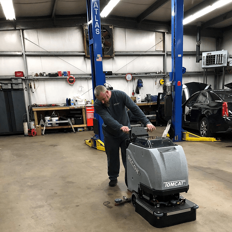 Tomcat floor scrubber showcasing its cleaning power