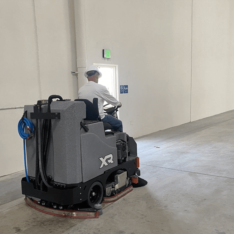 Tomcat floor scrubber showcasing its cleaning power