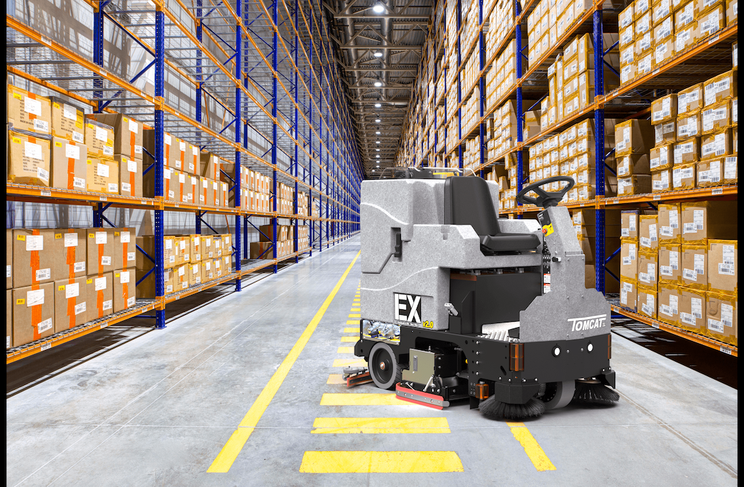 Tomcat showcasing the various applications of their floor scrubbers, in this case, in Distribution - Warehouse