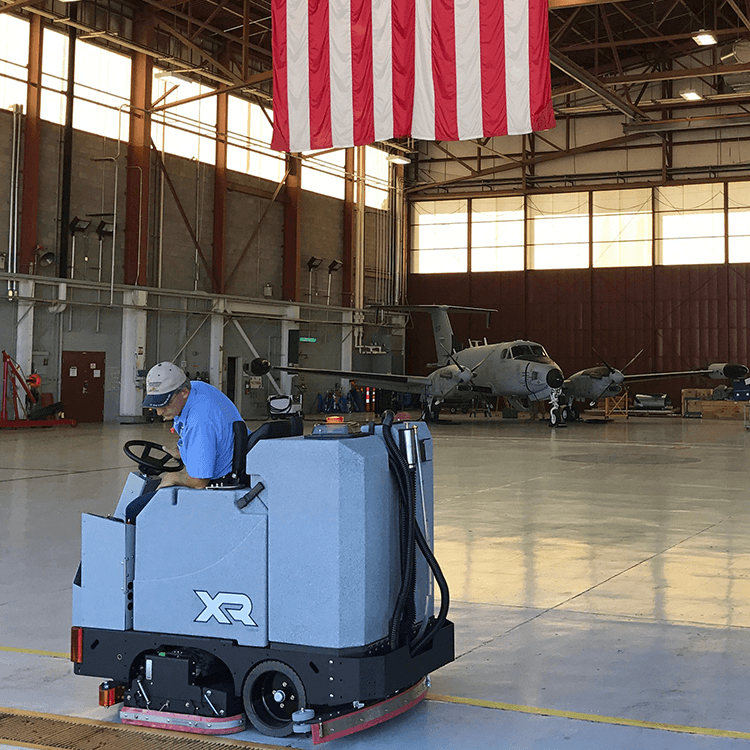 Tomcat floor scrubber showcasing its cleaning power