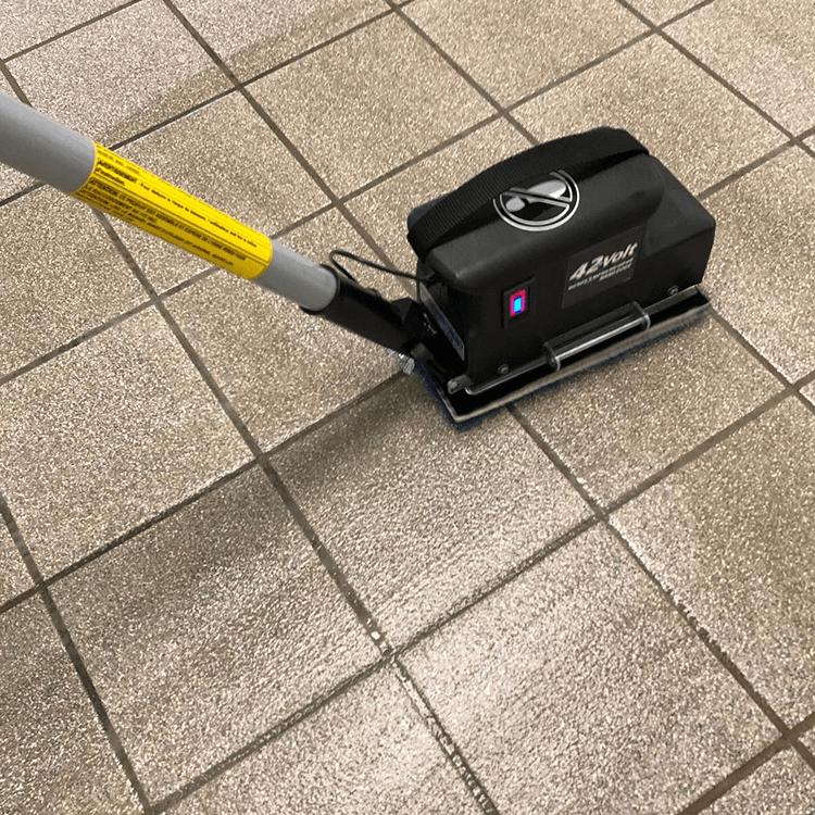 Tomcat floor scrubber showcasing its cleaning power