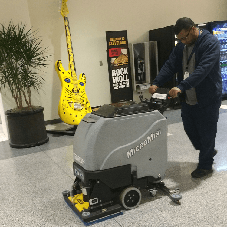 Tomcat floor scrubber showcasing its cleaning power