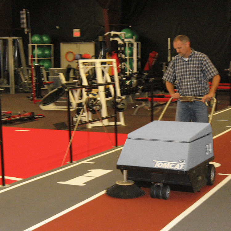 Tomcat floor scrubber showcasing its cleaning power