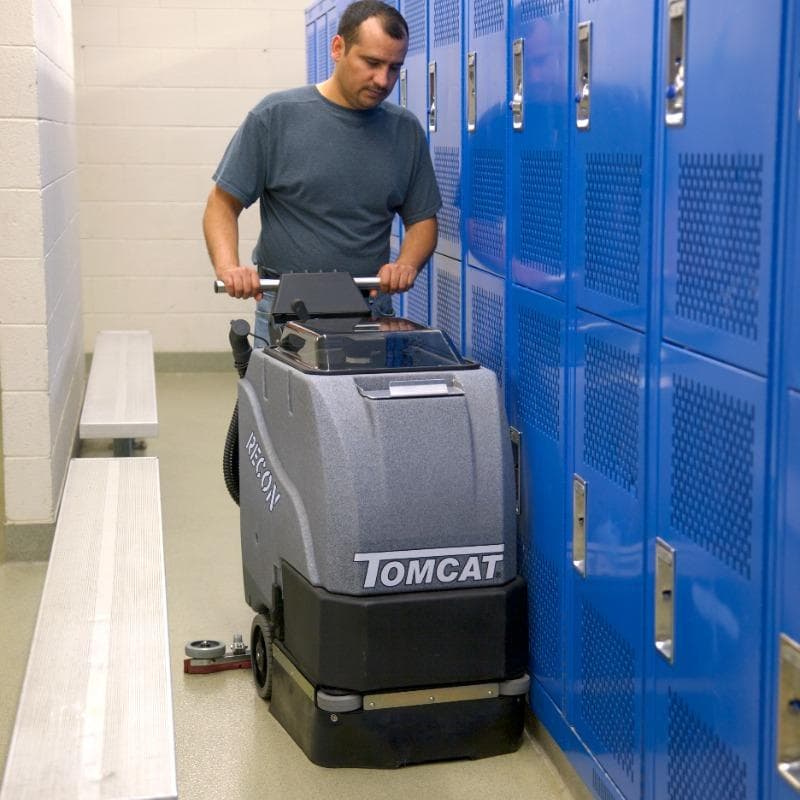 Tomcat Walk Behind Floor Scrubbers Recon locker room epoxy RECON Walk Behind Floor Scrubber cleaning the epoxy floors in the locker room of a Kansas City, Kansas middle school gym