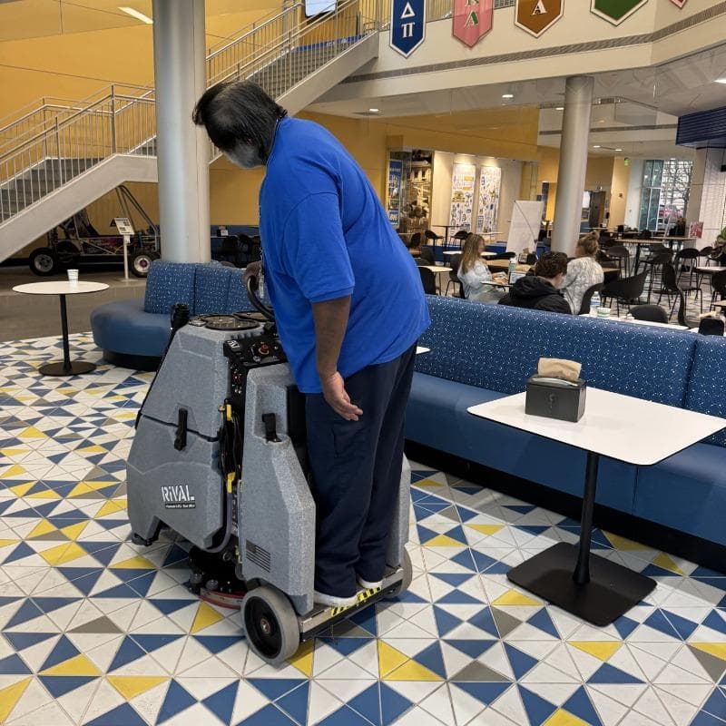 Tomcat Stand On Floor Scrubbers Rival café ceramic tile A Tomcat Rival stand on floor scrubber cleaning the ceramic tile floor of a café at a university in Lexington, KY