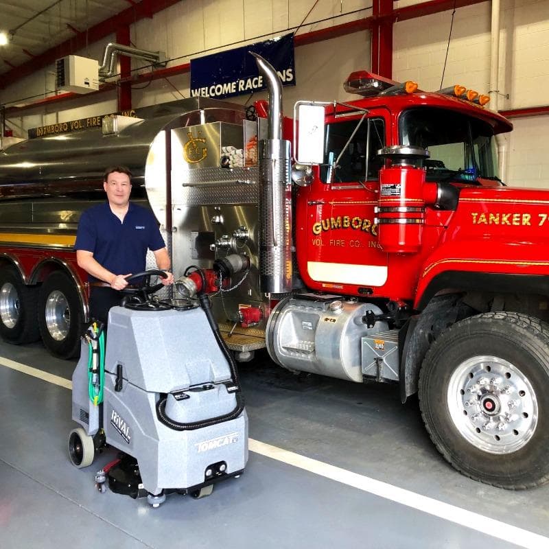 Tomcat Stand On Floor Scrubbers Rival firestations epoxy A Tomcat Rival stand on battery floor scrubber cleaning the epoxy floor of a firehouse in Pennsylvania.