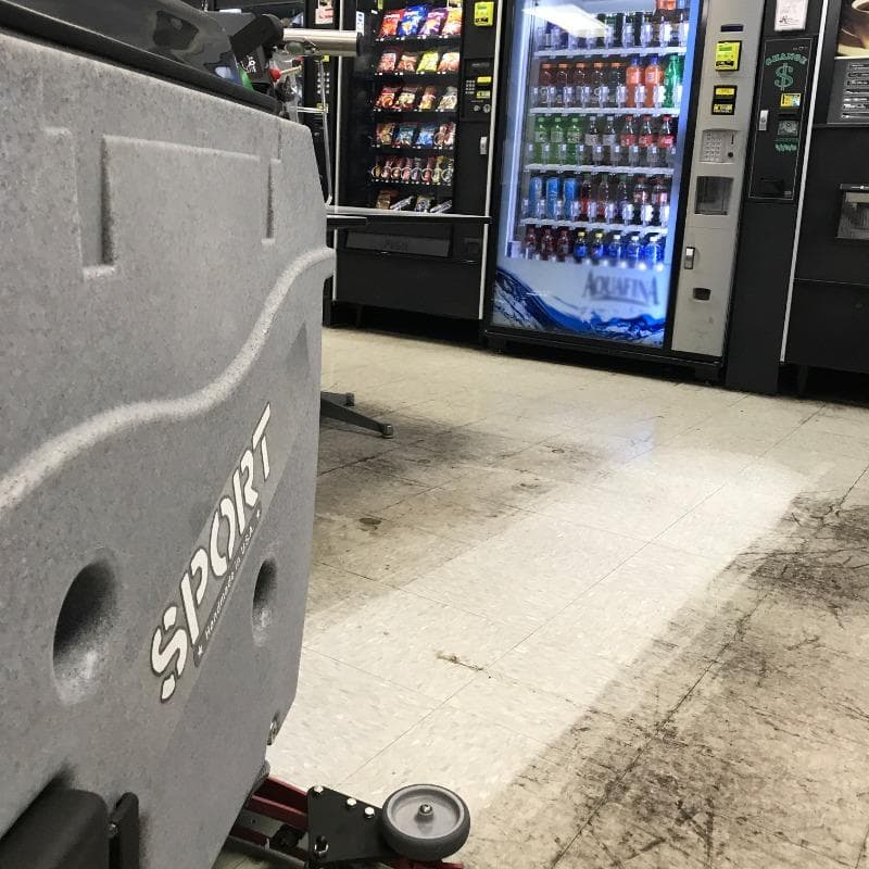 Tomcat Walk Behind Floor Scrubbers Sport lunchrooms vct SPORT Walk Behind Floor Scrubber cleaning the VCT floor in a lunch room of a tech school in Nashville,  Tennessee