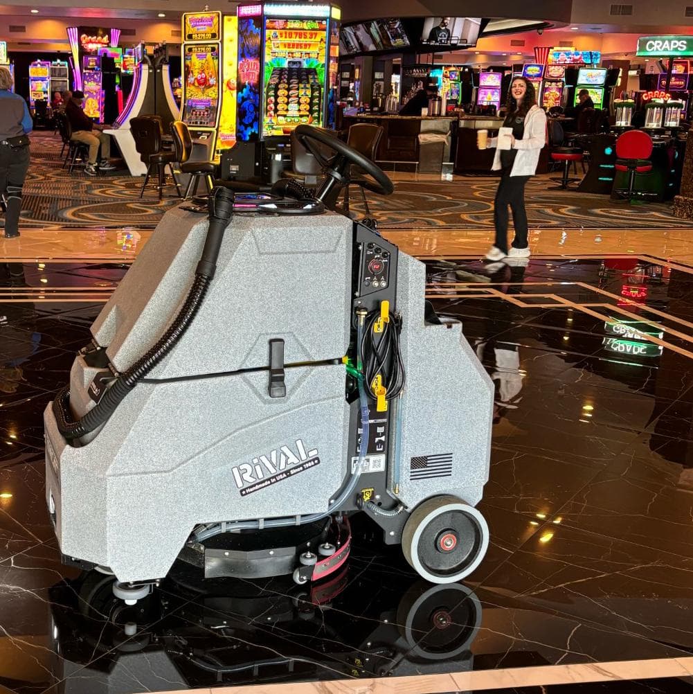 Tomcat Stand On Floor Scrubbers Rival  lobby marble The Tomcat Rival stand on floor scrubber cleans crystalized marble floors in a Nevada casino lobby.