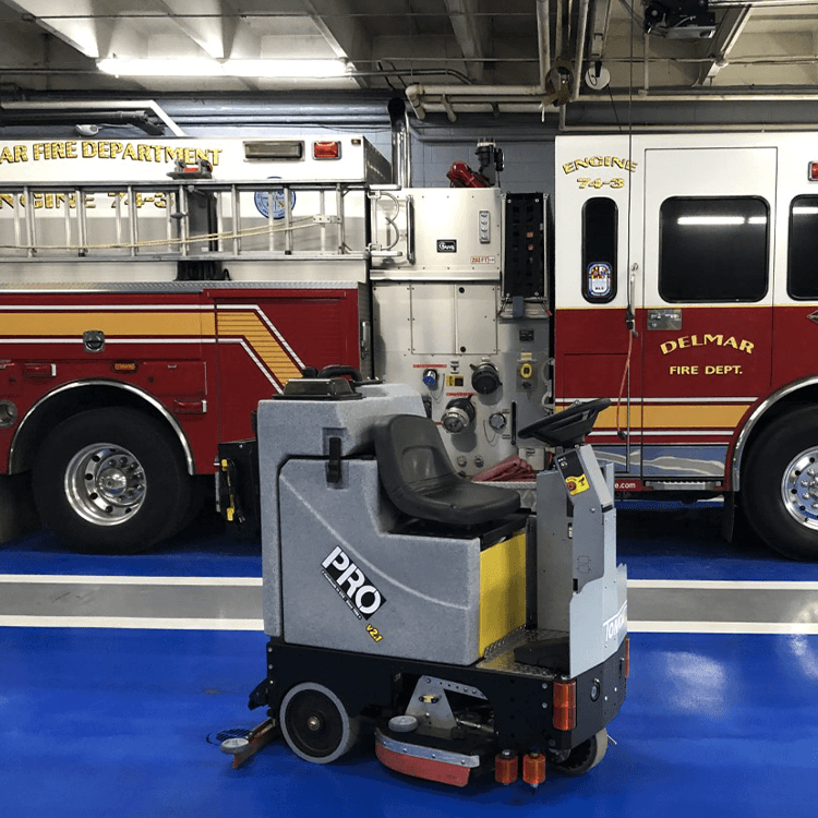 Tomcat floor scrubber showcasing its cleaning power